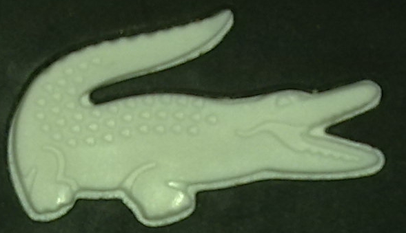 Логотип Lacoste на парфюме Challenge с торца